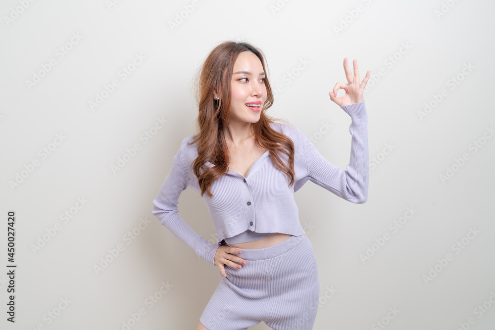 portrait beautiful woman with hand show ok or agree hand sign portrait beautiful woman with hand show ok or agree hand sign
