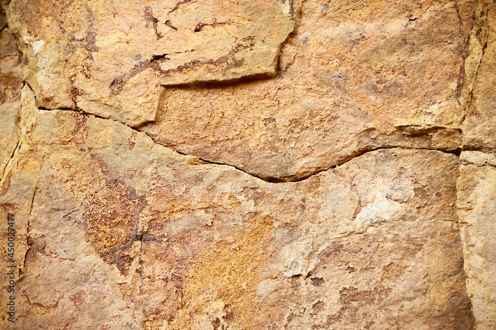 Natural grunge brown rock texture with rough and line cracked Natural grunge brown rock texture with rough and line cracked