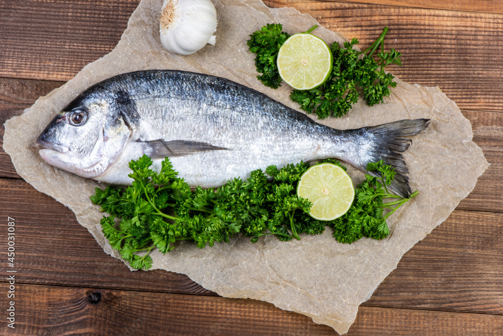 Sea bream and ingredients for cooking Sea bream and ingredients for cooking