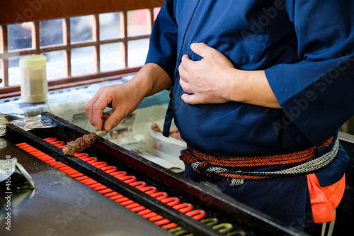 Valokuva Hida beef stick being grilled cooking by Japanese chef in Takayama restaurant, Japan