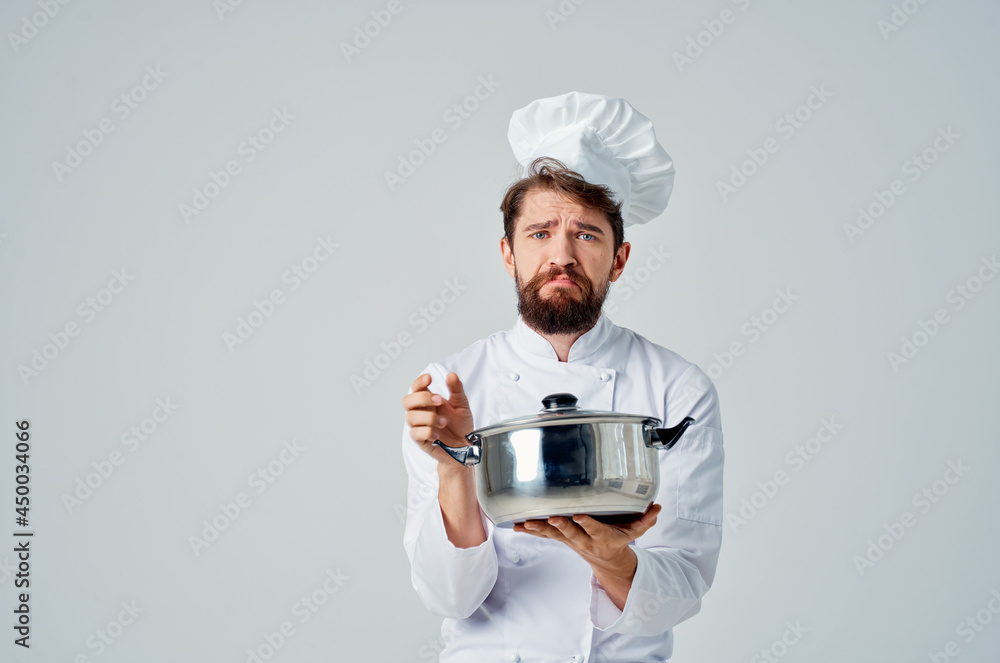 chef with a saucepan in his hands restaurant emotions cooking chef with a saucepan in his hands restaurant emotions cooking