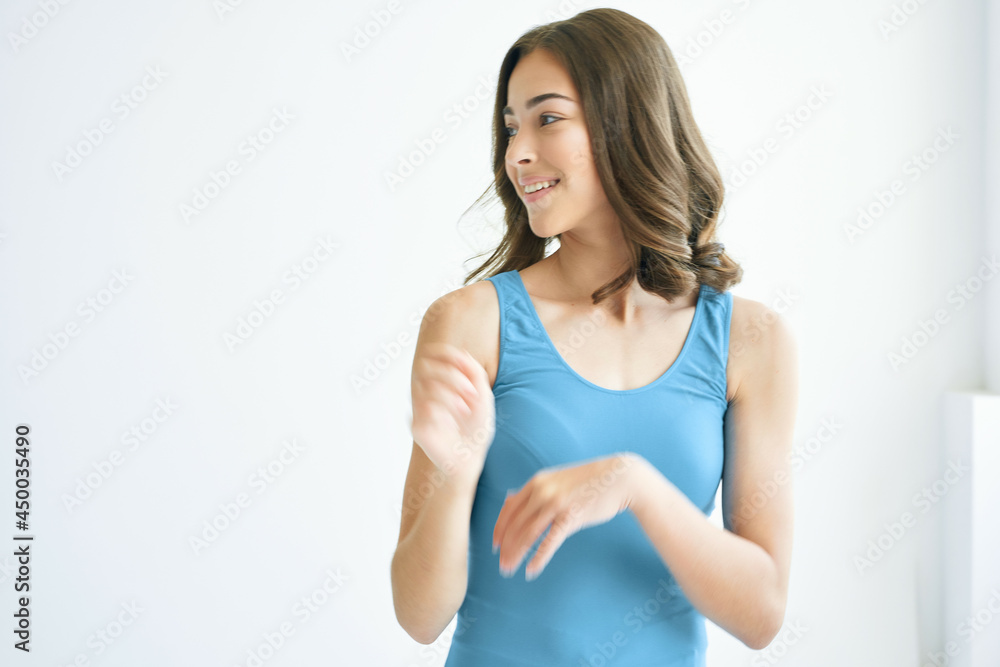 pretty brunette in blue tank top posing smile fashion pretty brunette in blue tank top posing smile fashion