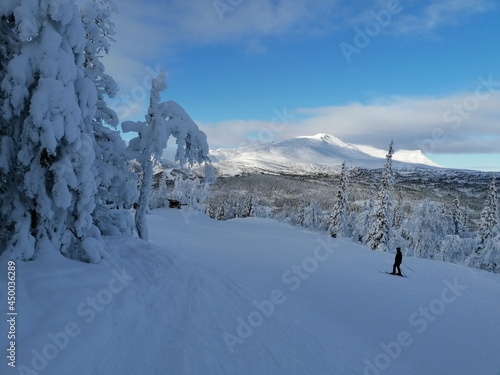 Skiing in the beautiful sunny and snowy weather in   re Mountains Ski Resort in Sweden