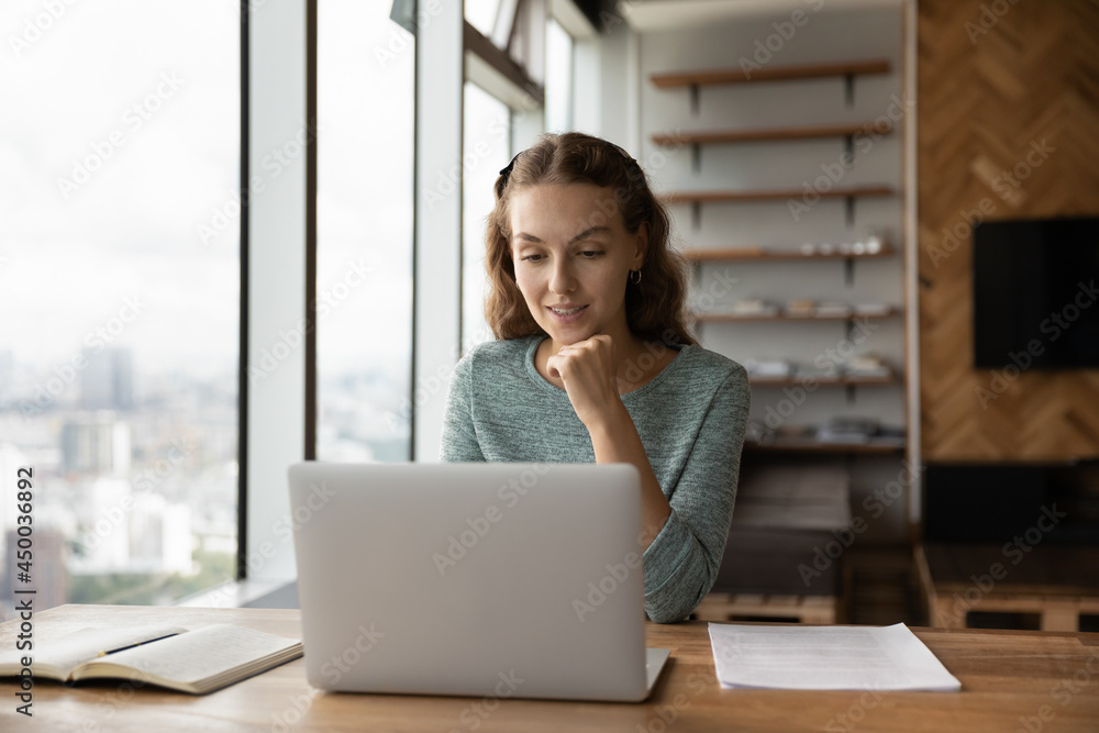 Happy female employee using laptop, working from home. Manager making video call, giving consultation to client from modern office. Gen Z student girl studying online, watching virtual webinar Happy female employee using laptop, working from home. Manager making video call, giving consultation to client from modern office. Gen Z student girl studying online, watching virtual webinar