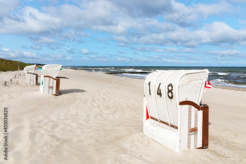 Hooded beach chairs at Graal-Müritz on the Baltic Sea shore of Mecklenburg-Vorpommern, Germany photo