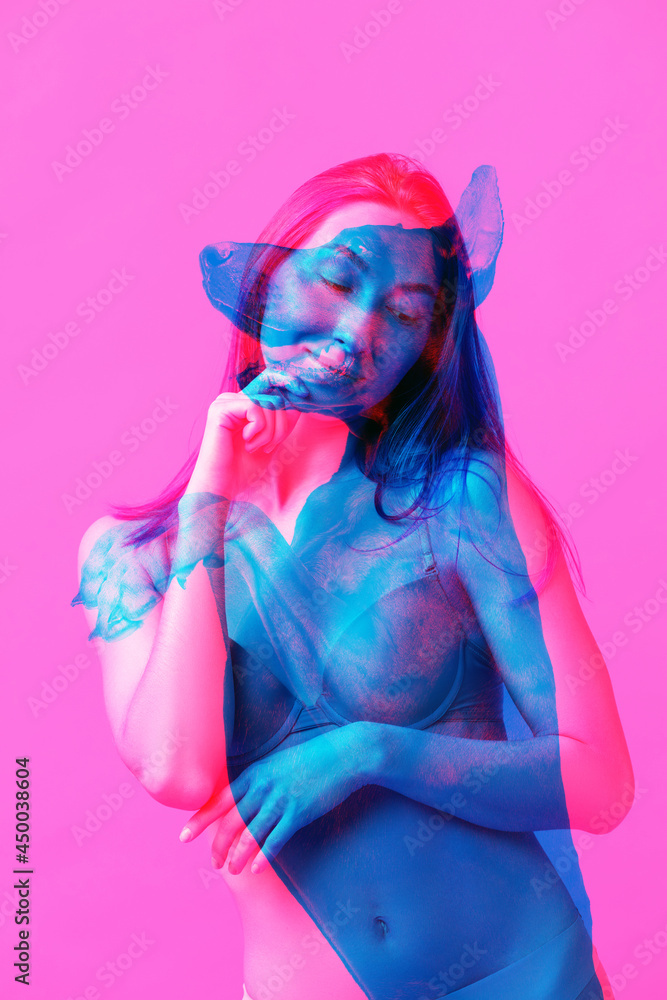 Pretty young woman and silhouette of dog isolated over pink background with glitch effect. Concept of beauty, fashion, aspiration. Diversity. Art collage