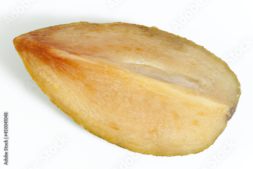 sapodilla plum with cut isolated on white photo