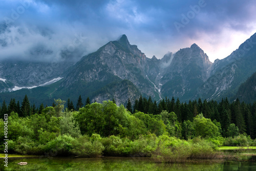 Stormy Clouds Over Alpine Lake in Fusine Italy