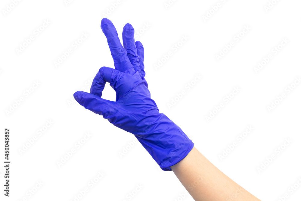Hand in medical rubber glove ok gesture, isolated on a white background Hand in medical rubber glove ok gesture, isolated on a white background