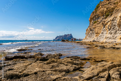bassetes beach in Calpe. rock of penon ifach in the background. mediterranean coast landscape in the city of Calpe. coastal city located in the Valencian commun
