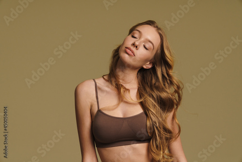 Smiling young white woman in underwear