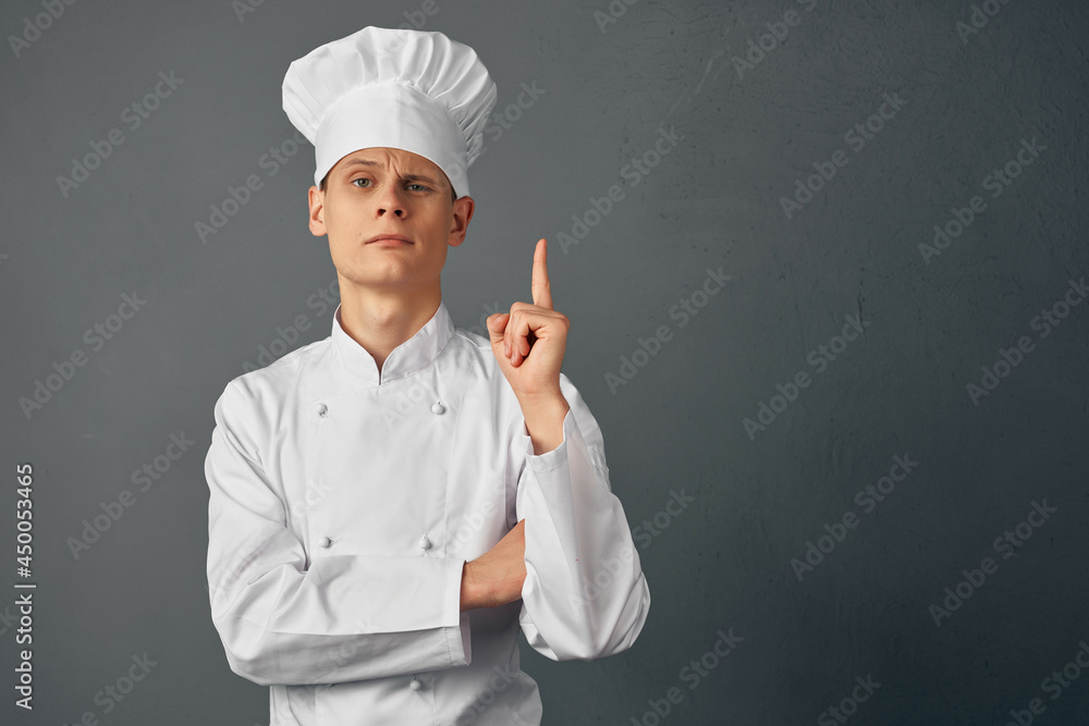 emotional chef gestures with his hand to a professional foodie emotional chef gestures with his hand to a professional foodie