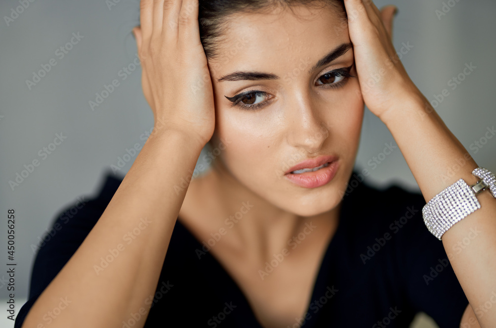 Obraz premium pretty woman in black dress fashion studio decoration light background