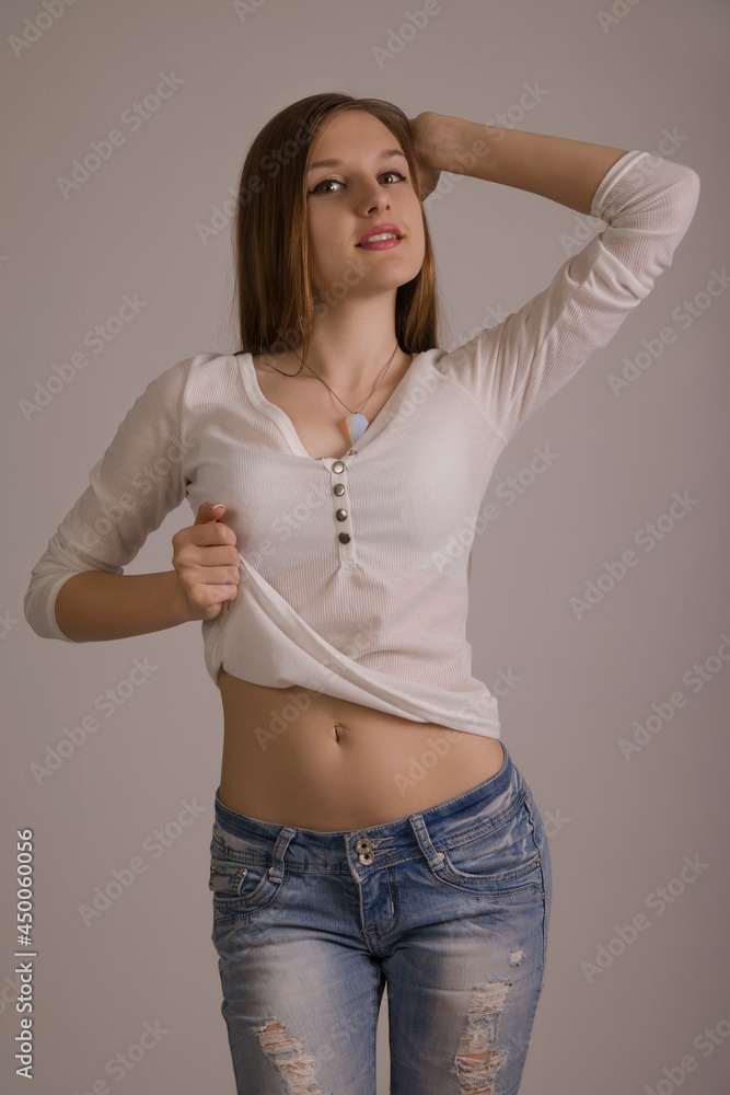 slender woman in pants on white slender woman in pants on white