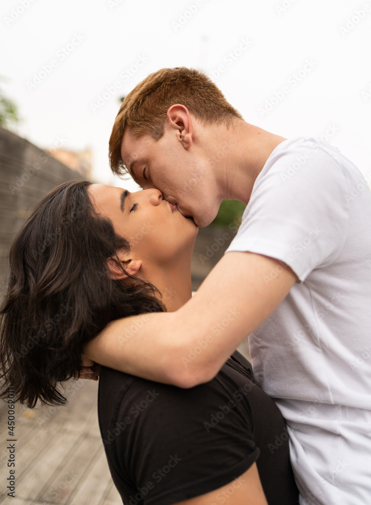 Vertical shoot of kiss of a homosexual couple Vertical shoot of kiss of a homosexual couple