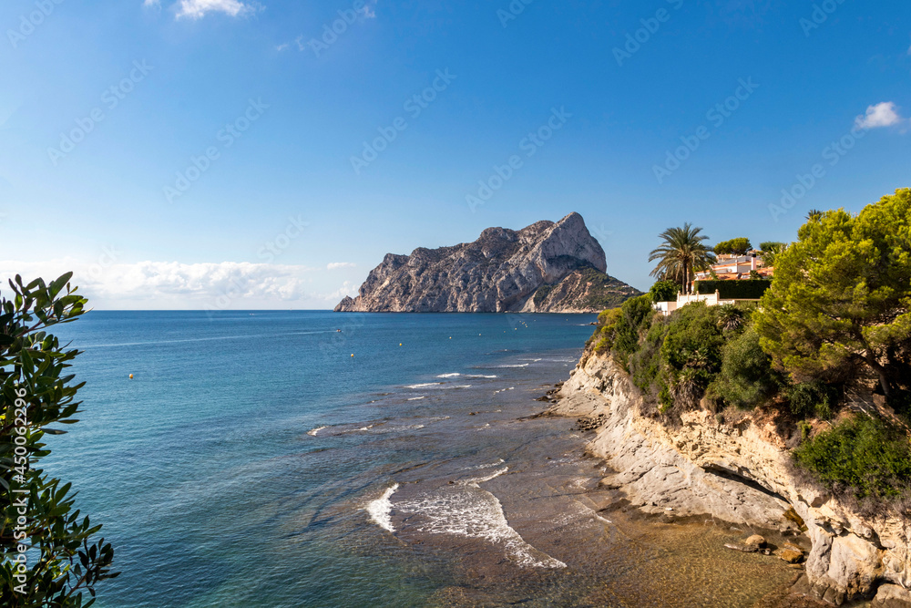 cove in Calpe. rock of penon ifach in the background. mediterranean coast landscape in the city of Calpe. coastal city located in the Valencian community, Alicante, Spain