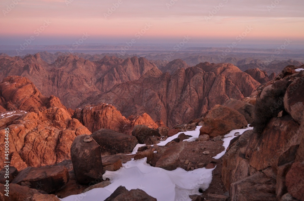 Sunrise in the mountains of Sinai , Egypt . Snow at the mountains . 