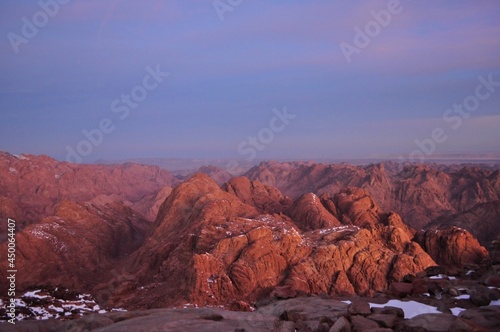 Sunrise in the mountains of Sinai   Egypt .  Snow at the mountains . 