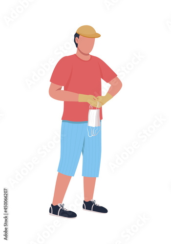 Guy picks up disposable surgical masks semi flat color vector character. Full body person on white. Plastic waste disposal isolated modern cartoon style illustration for graphic design and animation