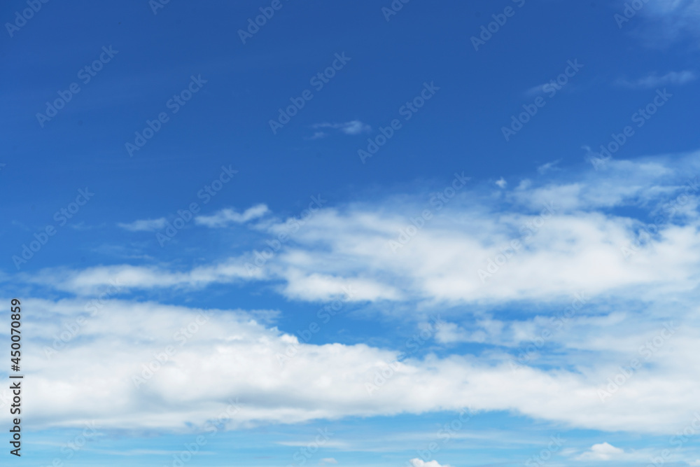 Beautiful clouds during spring time in a Sunny day. Blue sky and white fluffy clouds