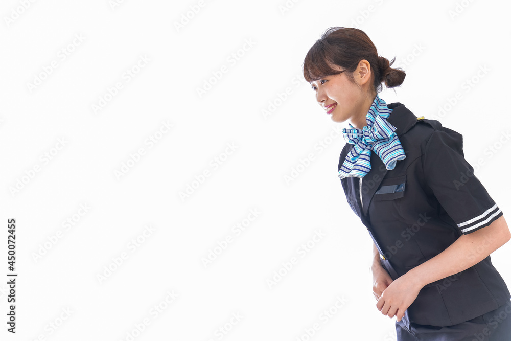 お辞儀をするキャビンアテンダント お辞儀をするキャビンアテンダント