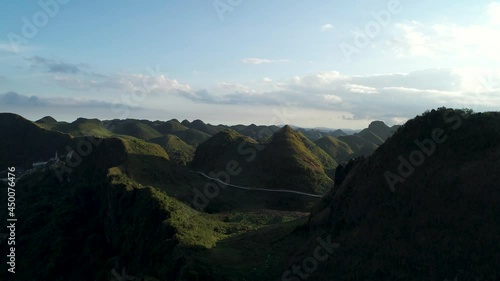 Unique mountain landscape on Cebu island with cone shape peaks, sunset photo