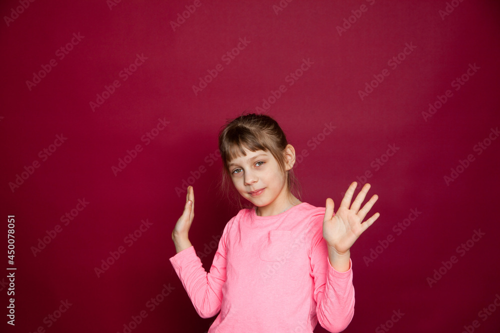 Cute blonbe child on pink background Cute blonbe child on pink background