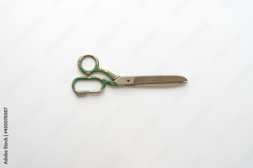 Flat lay composition with sewing scissors on white background. Flat lay composition with sewing scissors on white background.