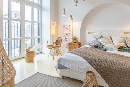 Vászonkép Fashionable modern interior of a light studio apartment with wooden columns in t