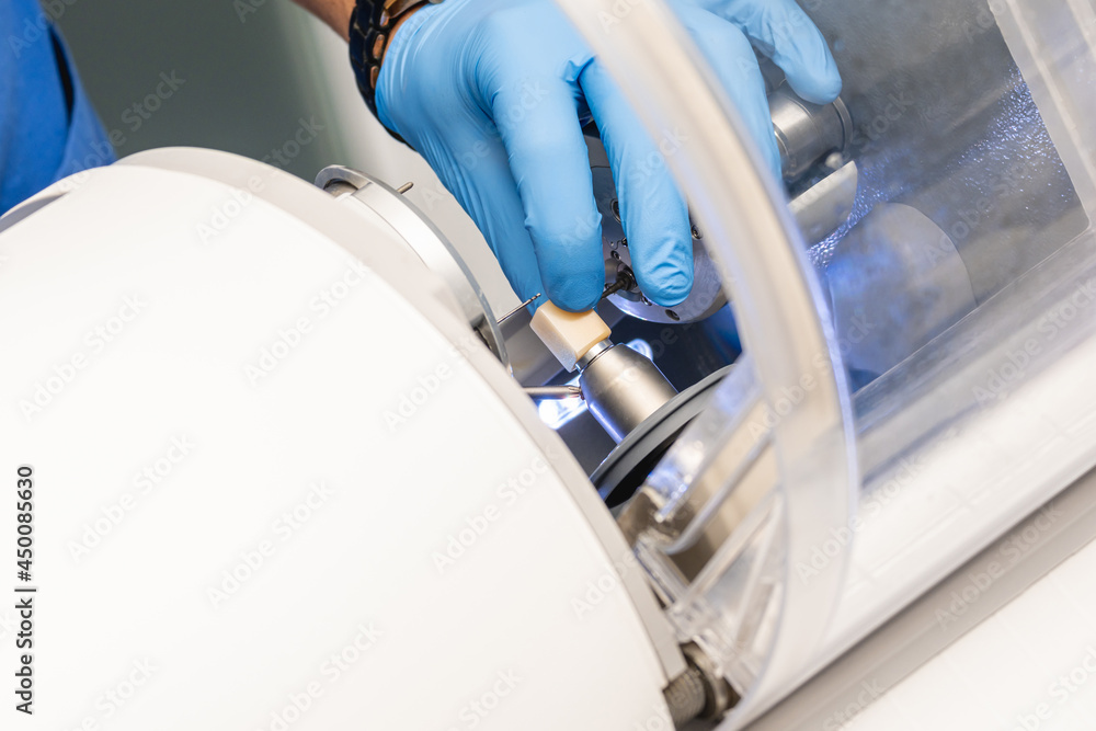 CAD CAM dental computer-aided machine. Digital modern dental laboratory ...