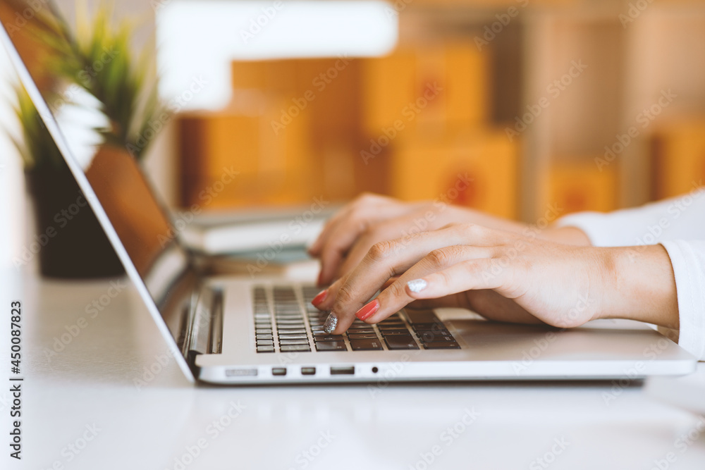 Woman hands typing on computer keyboard closeup, businesswoman or student using laptop at home, online learning, internet marketing, working from home, office workplace freelance concept Woman hands typing on computer keyboard closeup, businesswoman or student using laptop at home, online learning, internet marketing, working from home, office workplace freelance concept