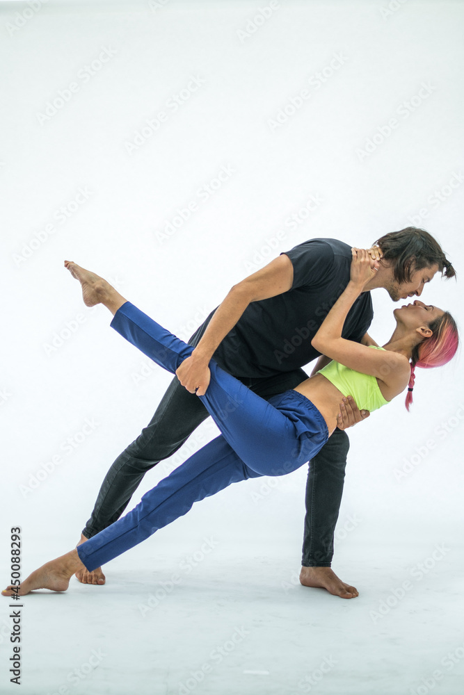 Romantic young couple kissing. Isolated on white background. man holding girlfriend on his arms. . High quality photo Romantic young couple kissing. Isolated on white background. man holding girlfriend on his arms. . High quality photo