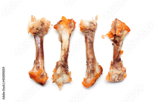 chicken bones gnawed after eating on a white background photo