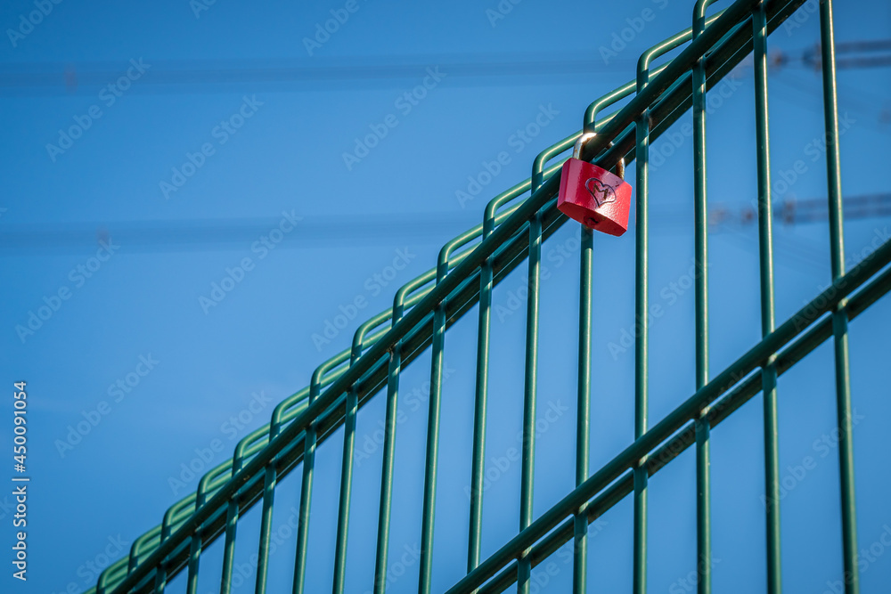 A Love lock on a gate with blurry background
