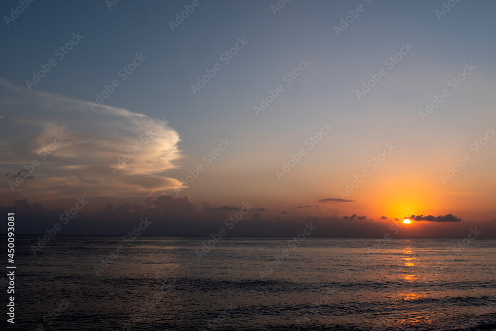 Amazing sunrise at the sea. Bali island, Indonesia.