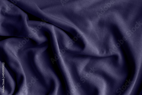Jersey cotton fabric texture. Crumpled purple violet textile background
