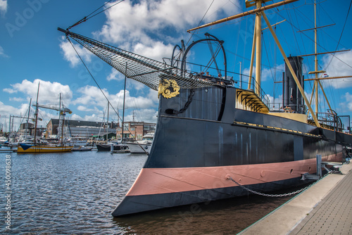 Den Helder, the Netherlands. July 31, 2021. Bow and stern of historical ram ship De Schorpioen at the quay of Willemsoord wharf at Den Helder.