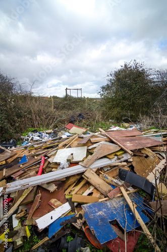 Illegally dumped trade waste, North Kent, UK..
