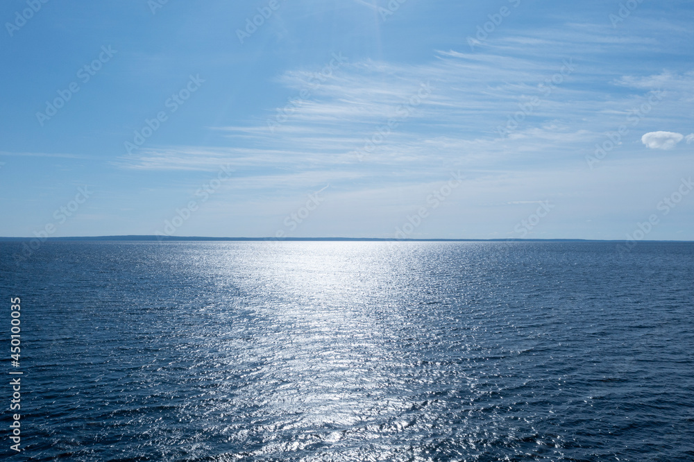Fototapeta premium Aerial view sky background. Aerial blue sky with clouds over the sea. Sky landscape over ocean. Aerial photography.