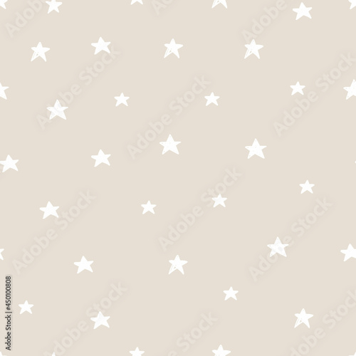 Vector abstract cute hand drawn seamless pattern with a stars on a beige background. Pastel baby texture ideal for fabric, wallpaper, wrapping paper, card, layout. Delicate children's print.