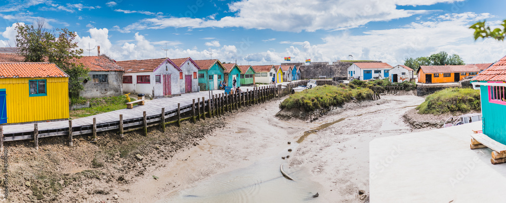 Colorful cabins on the port of the Château d'Oléron