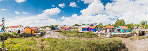 Colorful cabins on the port of the Château d'Oléron