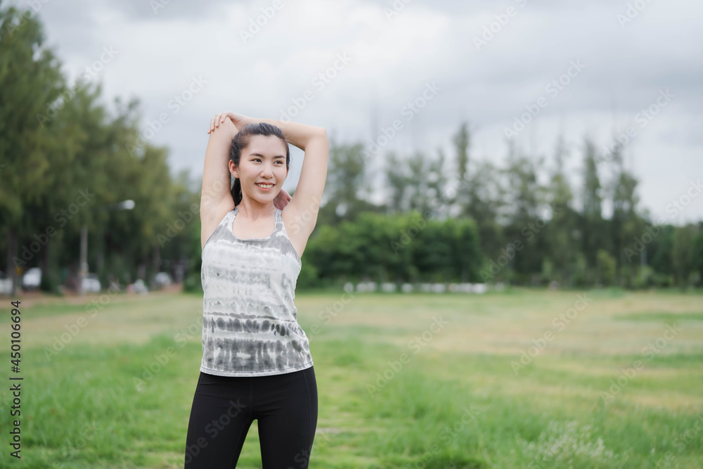Asian women stretching and warm up before exercise Asian women stretching and warm up before exercise