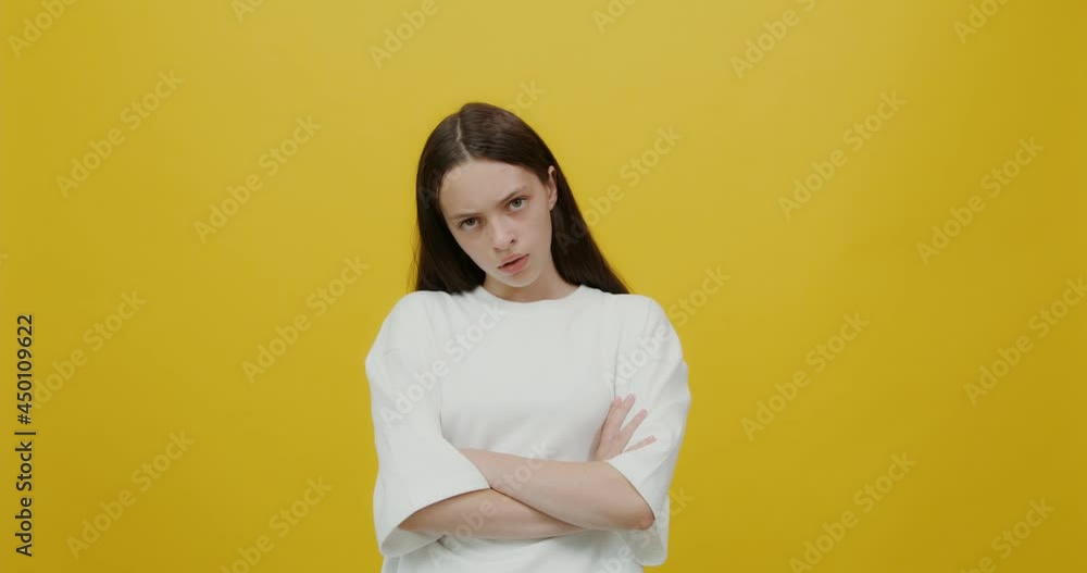 European young woman looks into the camera angrily, upset and offended European young woman looks into the camera angrily, upset and offended