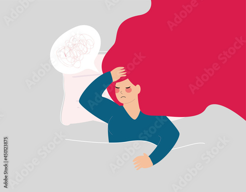 Woman has trouble sleeping and suffer from insomnia. Girl has difficult to fall asleep and has headaches at night. Female looks sleepy and stressed while lying on bed. mental health, insomnia concept.