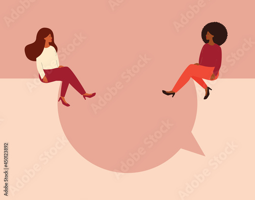 Women talking concept. Strong girls sitting and having a discussion on a big speech bubble while looking to each other. Women empowerment movement, gender equality, business women concept. Vector.