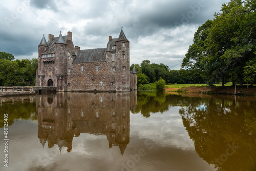 The beautiful lake of the Chateau Trecesson  medieval castle  Camp  n  ac commune in the Morbihan department  near the Broceliande forest.