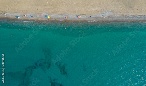 Wallpaper Mural Aerial view from flying drone of people relaxing on the beach. Paphos Cyprus Torontodigital.ca