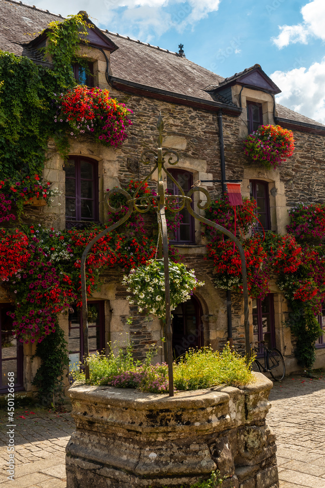 Water well in the square of the medieval village of Rochefort-en-Terre, Morbihan department in the Brittany region. France