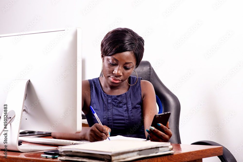 young businesswoman working in office. young businesswoman working in office.